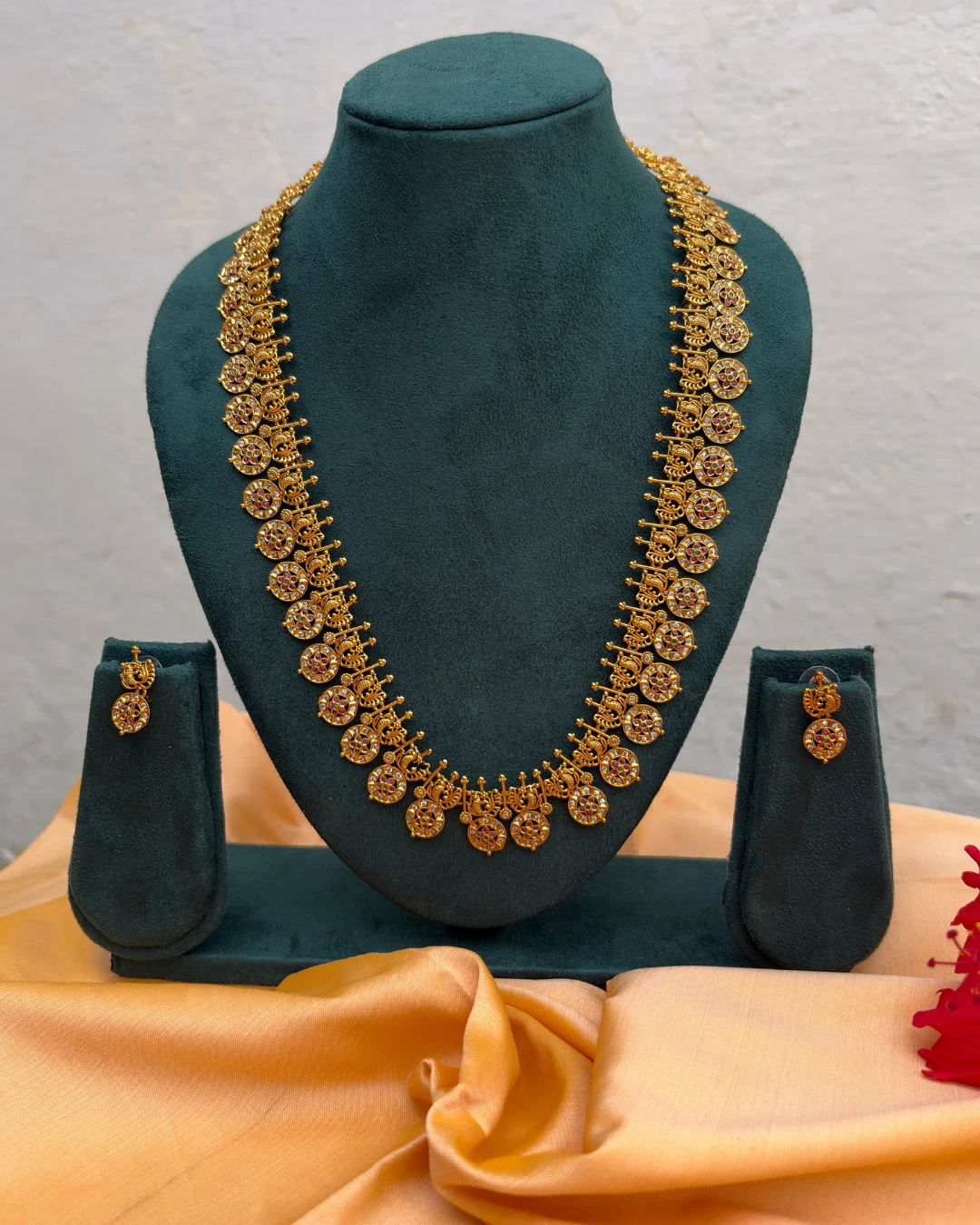 Traditional Gold-Tone Long Haram Necklace Set with Stone-Studded Motifs Traditional Gold-Tone Long Haram Necklace Set with Stone-Studded Motifs